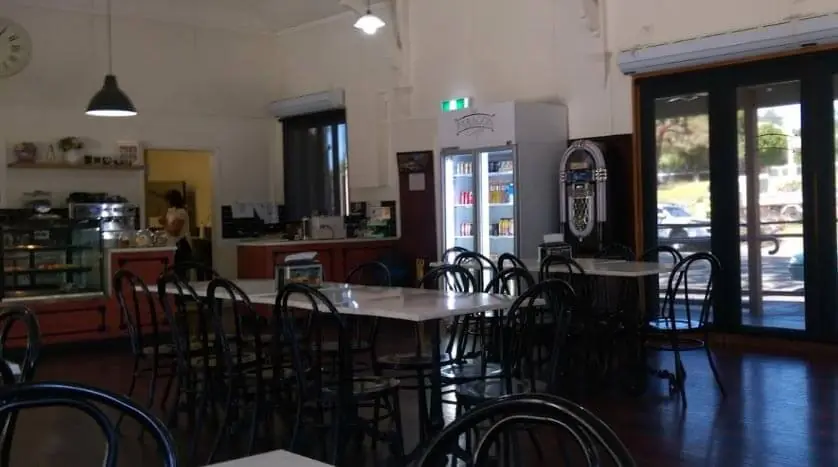 Inside The Paragon Café, with its long tables, display counter and timber floors
